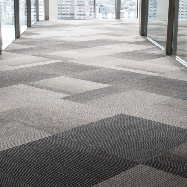 Contemporary patterned carpet tiles in an office hallway